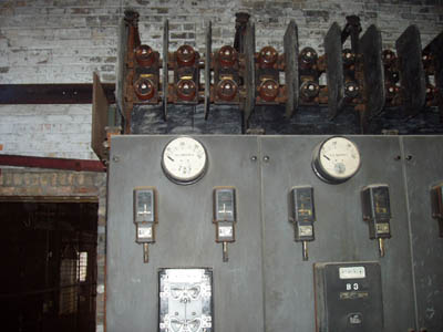 With multiple circuits running at 2300 Volts and up to 400 Amperes, this was obviously the main power switching room for the mill. (That's almost one million watts per panel.) The first time I was in Mill C, much of the building still had electrical service, so it is very possible that these panels were powered up. On the other hand, they may have been disconnected prior to that, and we sure didn't make any attempts to find out!